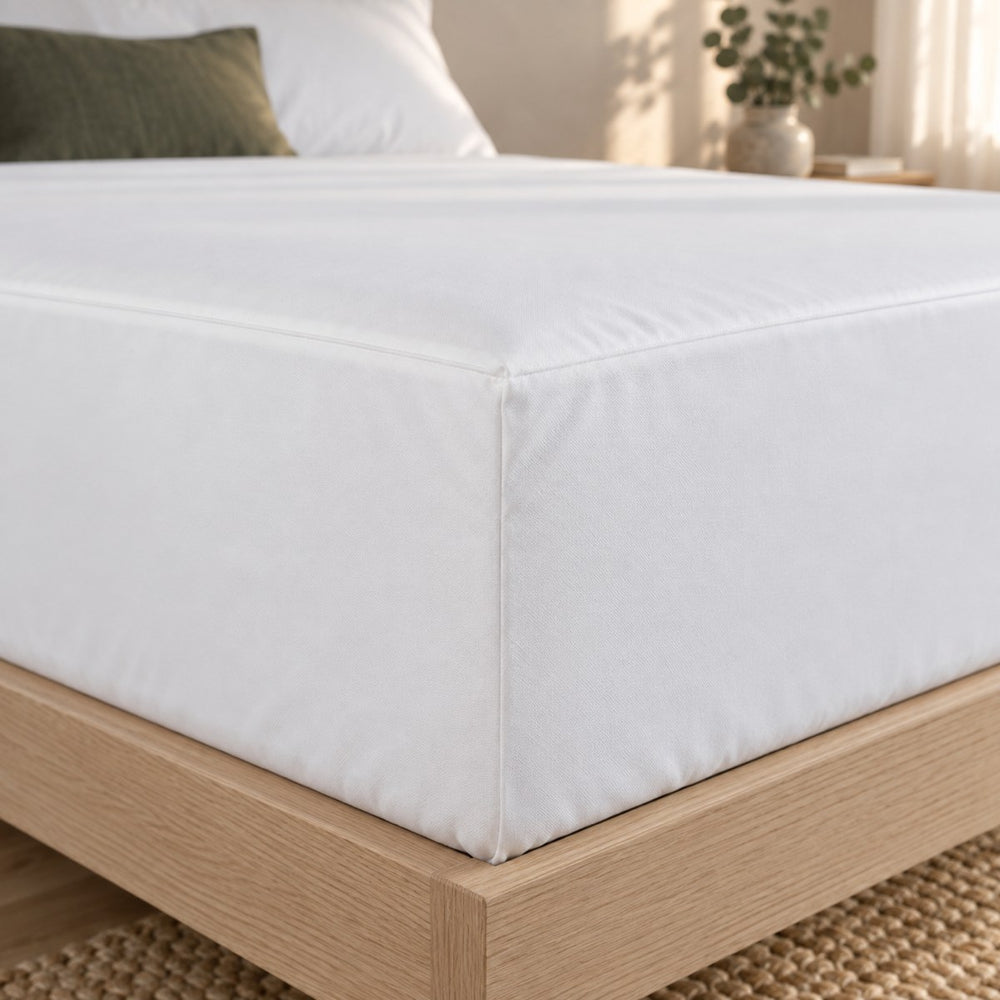 Close view of the Huxberry ActivGuard Mattress Encasement in evening light
