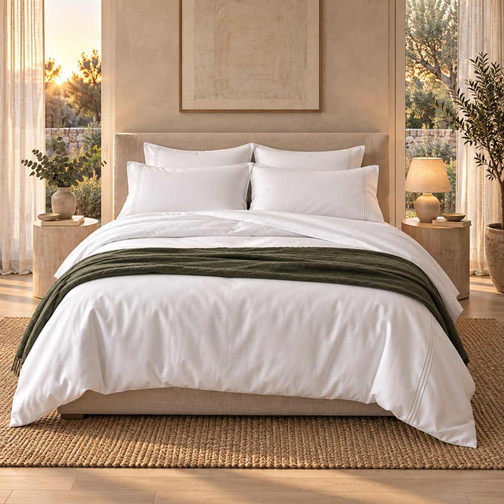 A made bed dressed in the Huxberry Essence Tencel Bedding Bundle