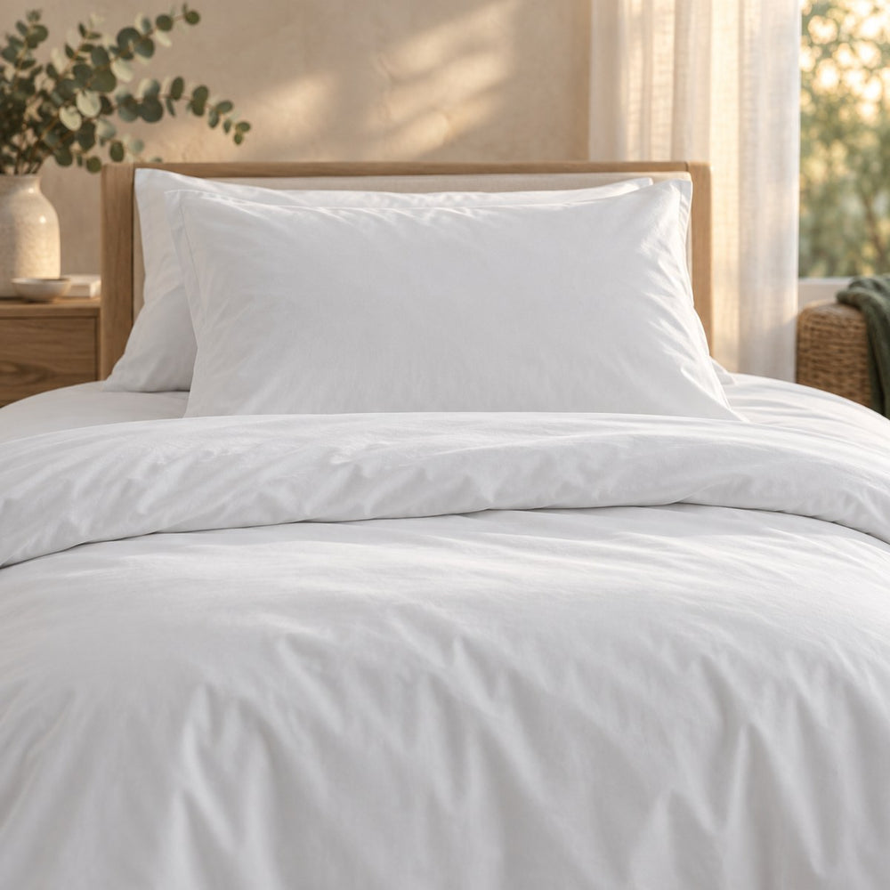 Close view of the Huxberry Organic Cotton Bedding Bundle in evening light