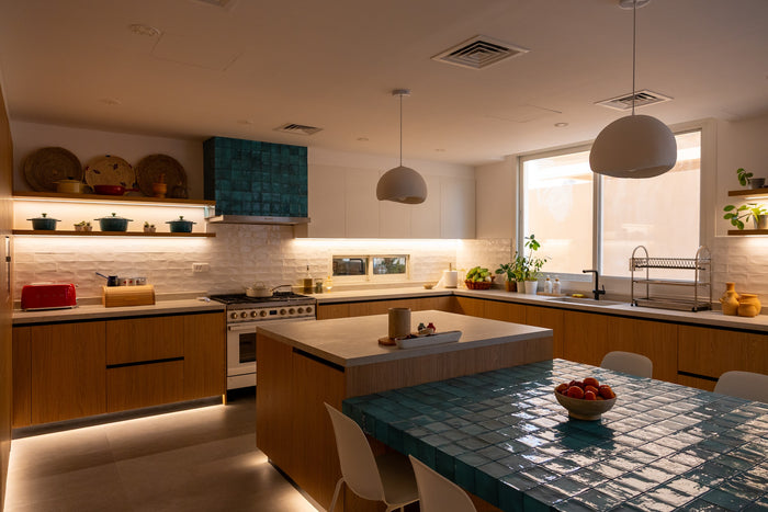 Huxberry bespoke oak kitchen at dusk, Abu Dhabi