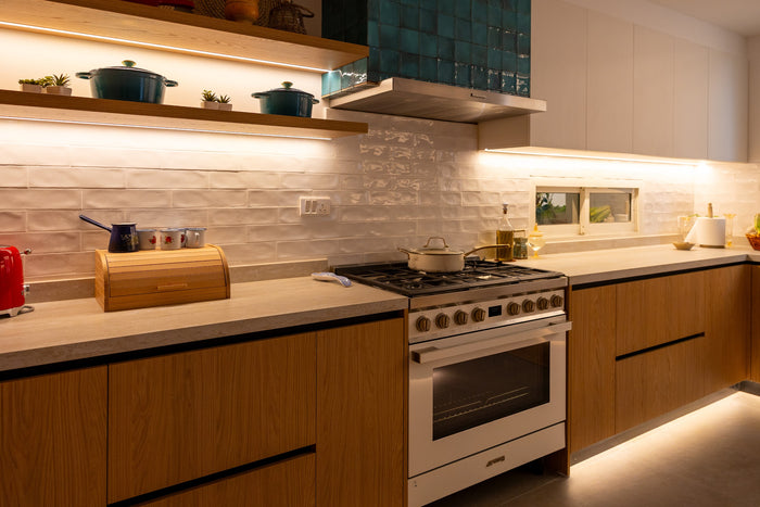 Huxberry bespoke oak kitchen at dusk, Abu Dhabi