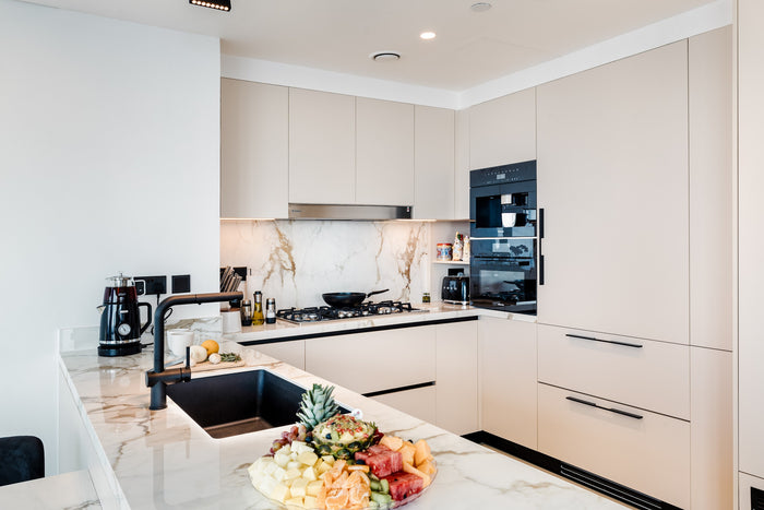 Huxberry bespoke cream kitchen with marble island, Downtown Dubai