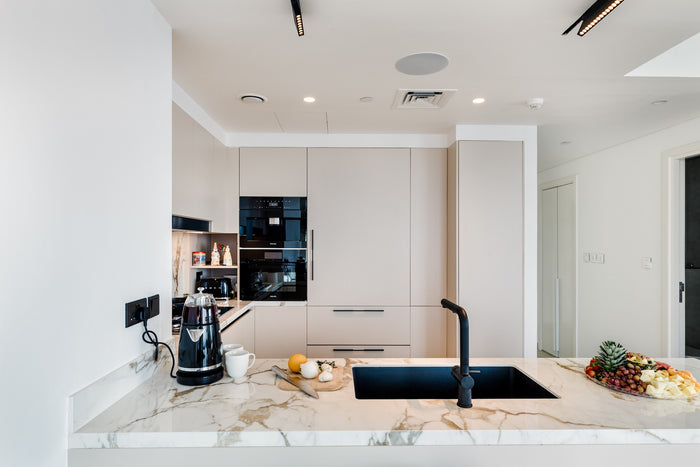 Huxberry bespoke cream kitchen with marble island, Downtown Dubai