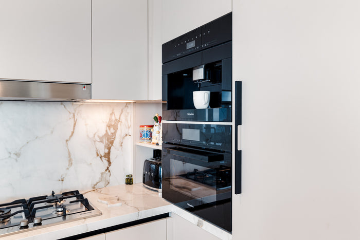 Huxberry bespoke cream kitchen with marble island, Downtown Dubai
