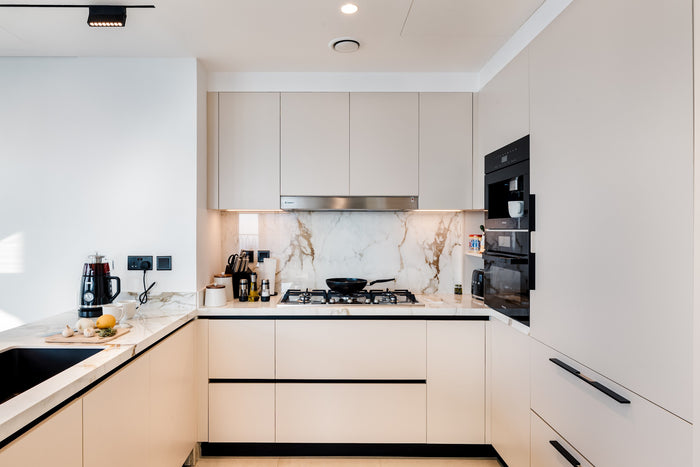 Huxberry bespoke cream kitchen with marble island, Downtown Dubai