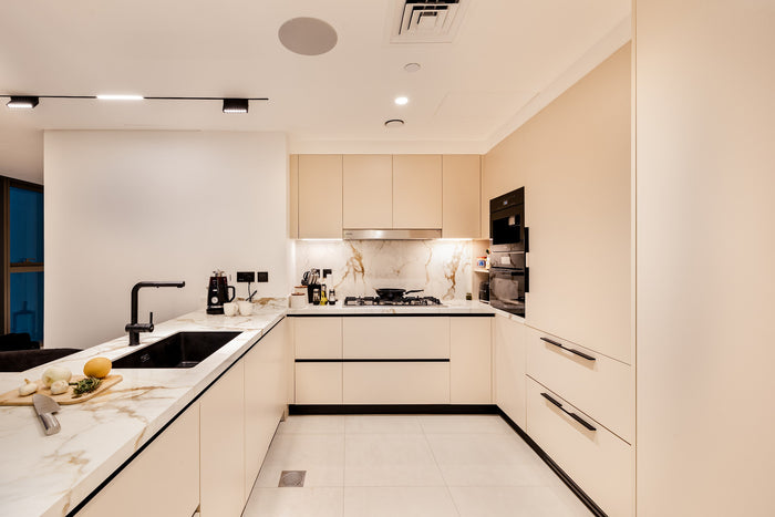 Huxberry bespoke cream kitchen with marble island, Downtown Dubai