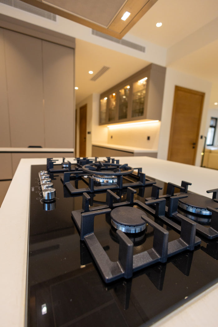 Huxberry bespoke taupe kitchen with quartz island, Jumeirah Park, Dubai