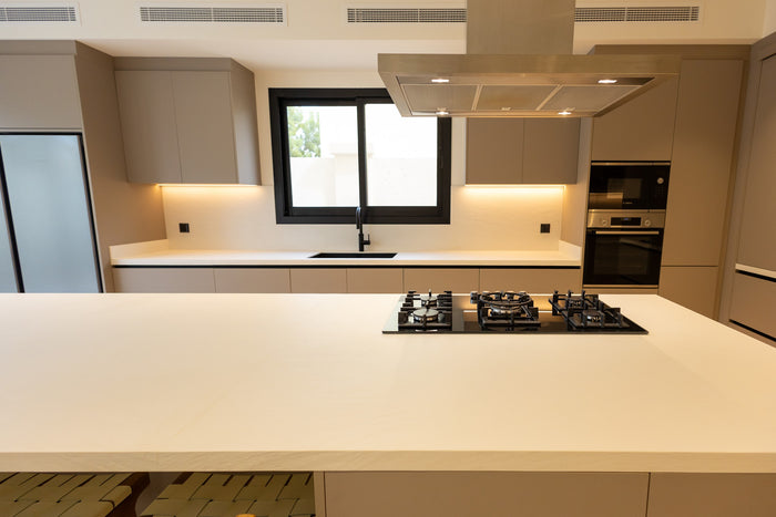 Huxberry bespoke taupe kitchen with quartz island, Jumeirah Park, Dubai