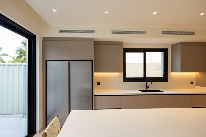 Huxberry bespoke taupe kitchen with quartz island, Jumeirah Park, Dubai