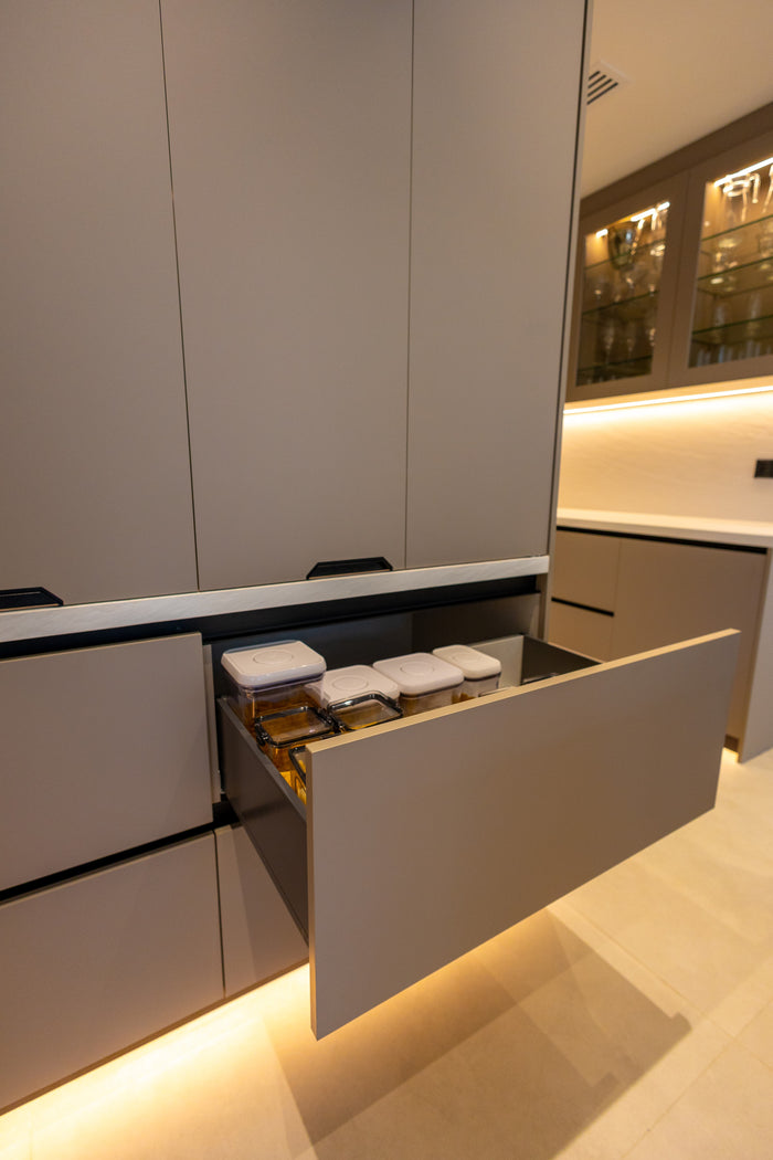 Huxberry bespoke taupe kitchen with quartz island, Jumeirah Park, Dubai