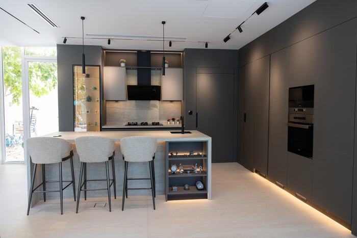 Huxberry bespoke graphite and travertine kitchen, Victory Heights, Dubai