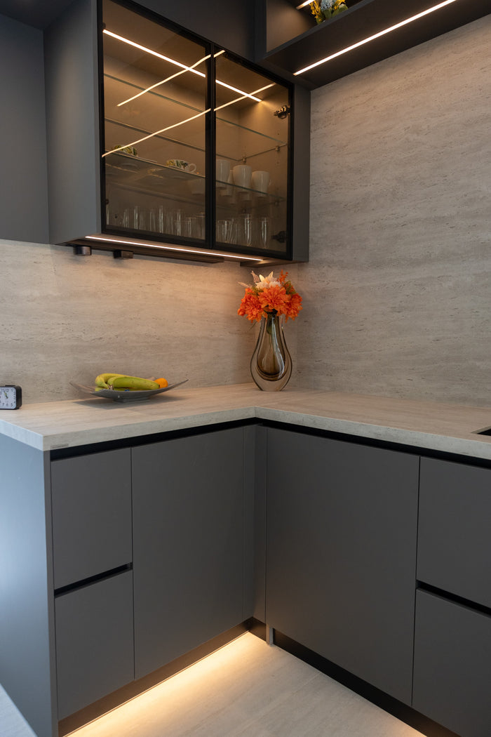 Huxberry bespoke graphite and travertine kitchen, Victory Heights, Dubai