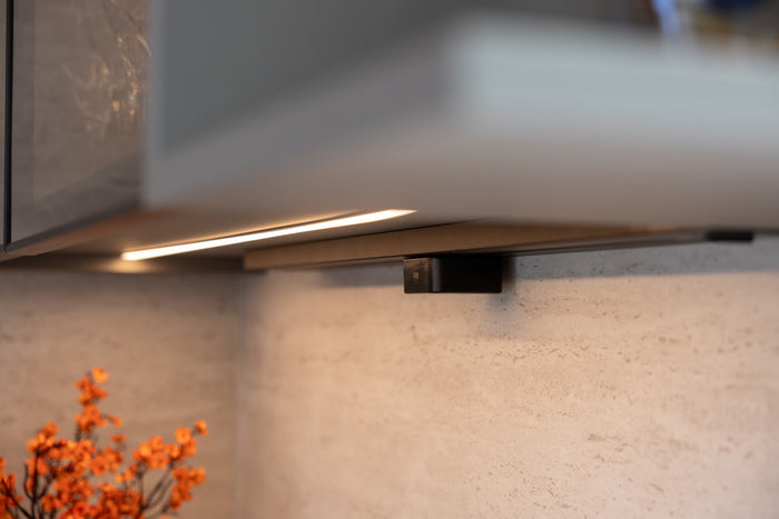 Huxberry bespoke graphite and travertine kitchen, Victory Heights, Dubai