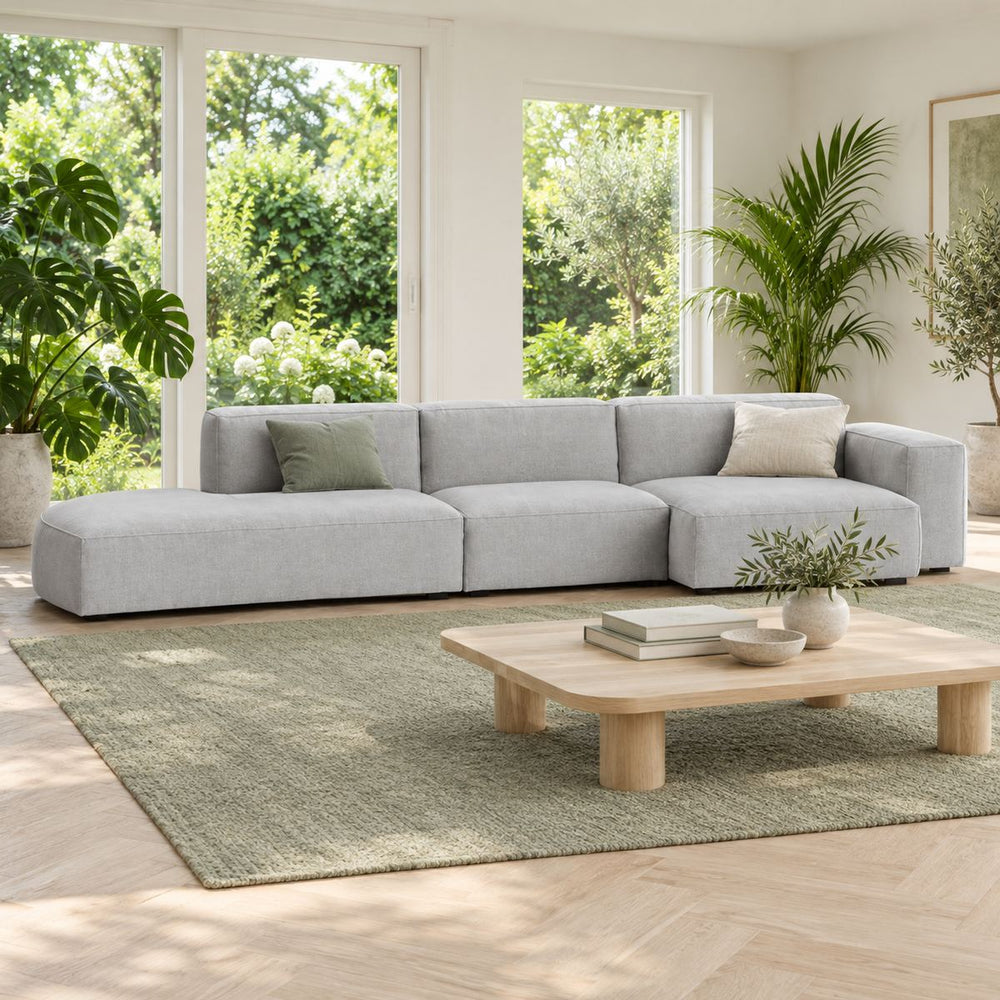 Burrow Sofa in a bright, plant-filled living room