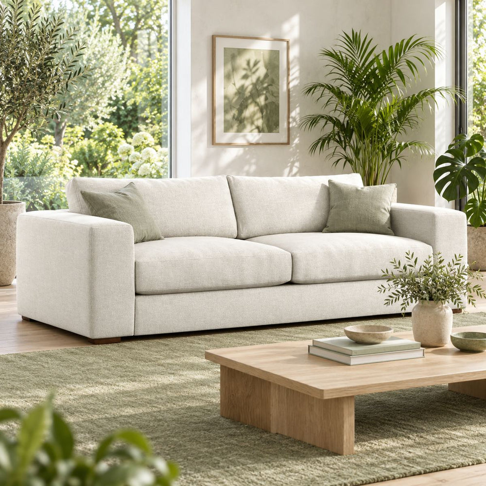 Carlton Sofa in a bright, plant-filled living room