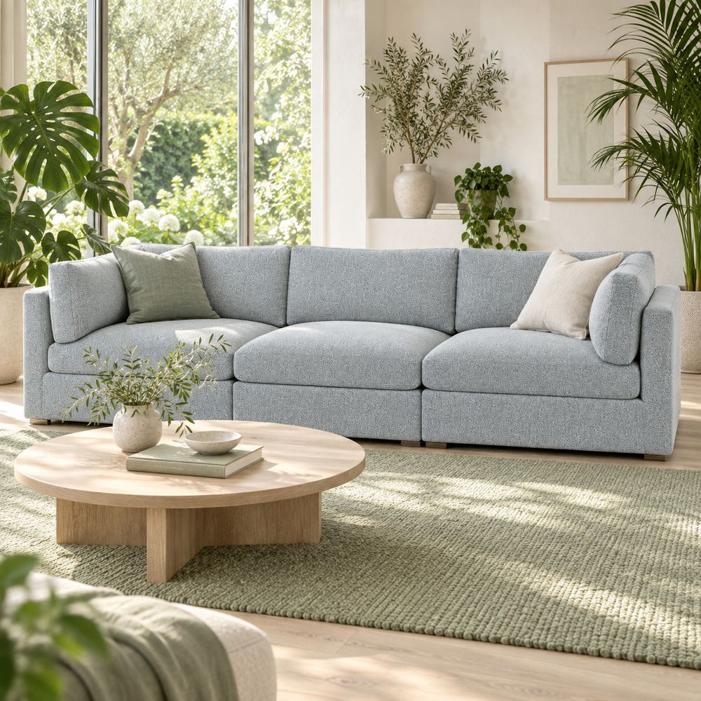 Haven Modular Sofa in a bright, plant-filled living room