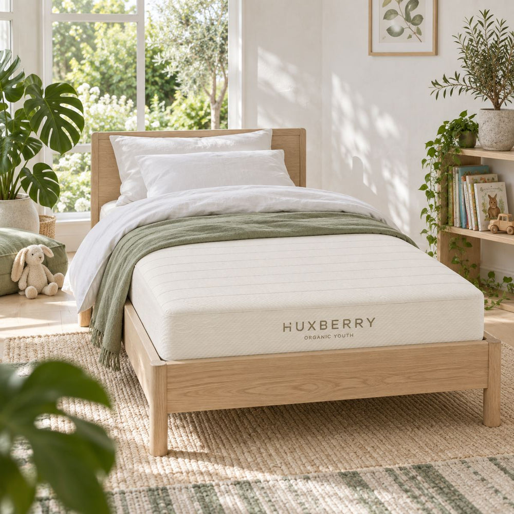 Organic Latex Youth Mattress in a bright, plant-filled bedroom
