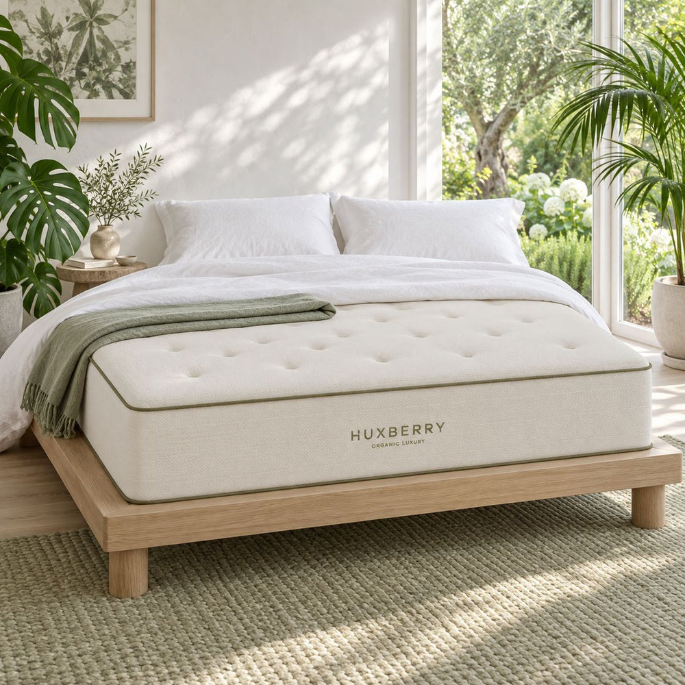 Organic Luxury Mattress in a bright, plant-filled bedroom