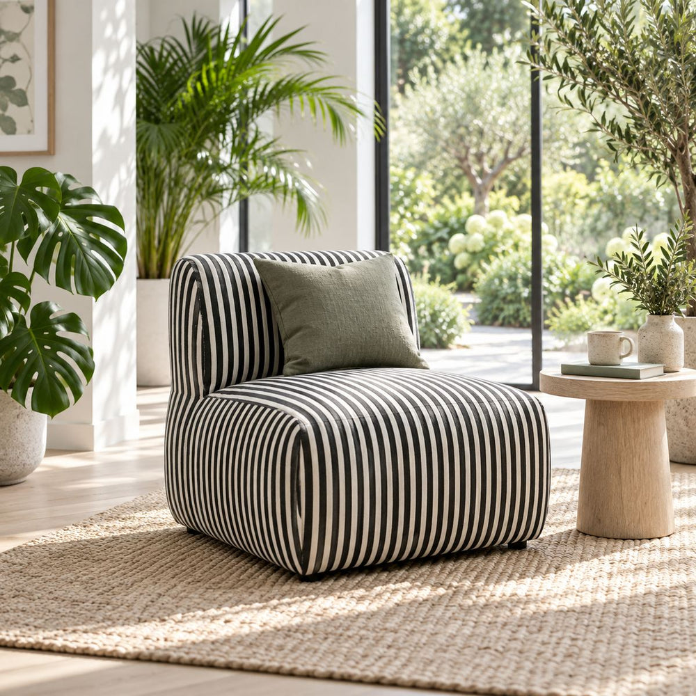 Savannah Accent Chair in a bright, plant-filled living room