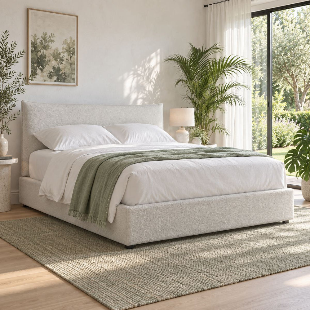 Scotia Bed in a bright, plant-filled bedroom