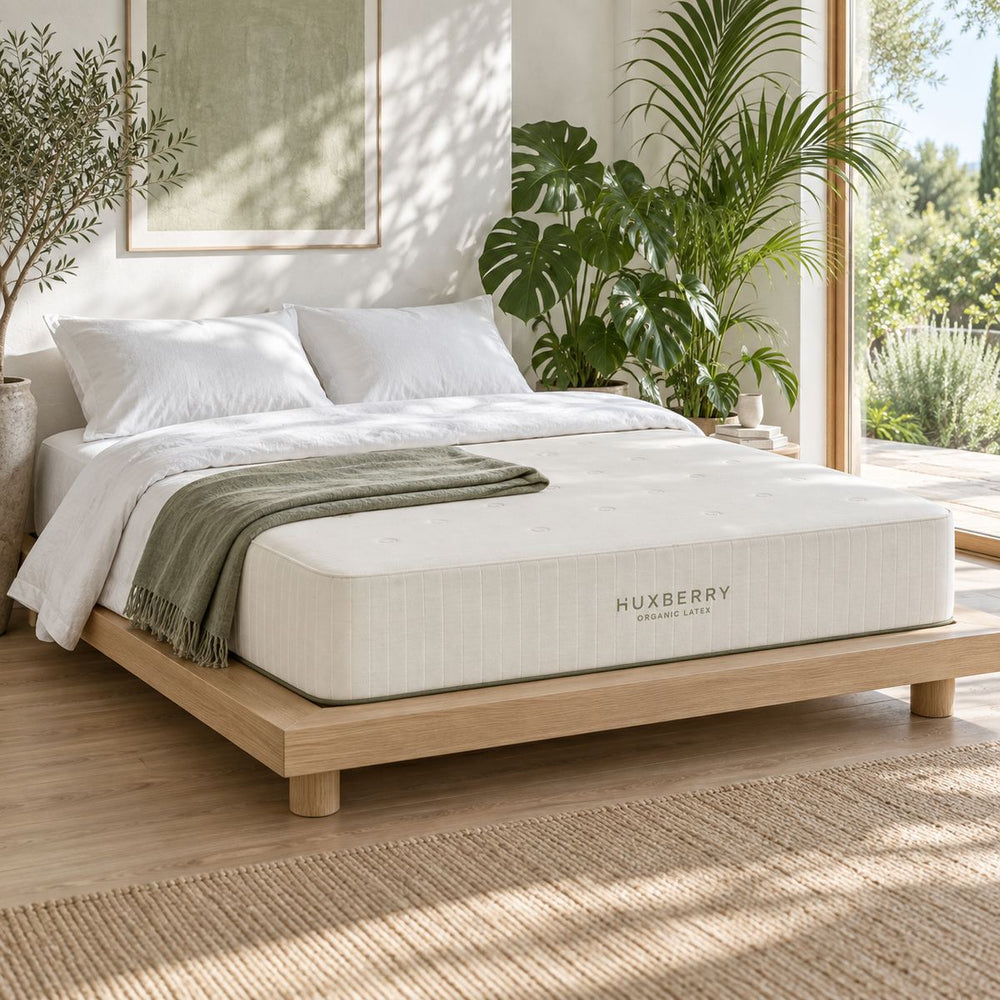 Organic Latex Mattress in a bright, plant-filled bedroom